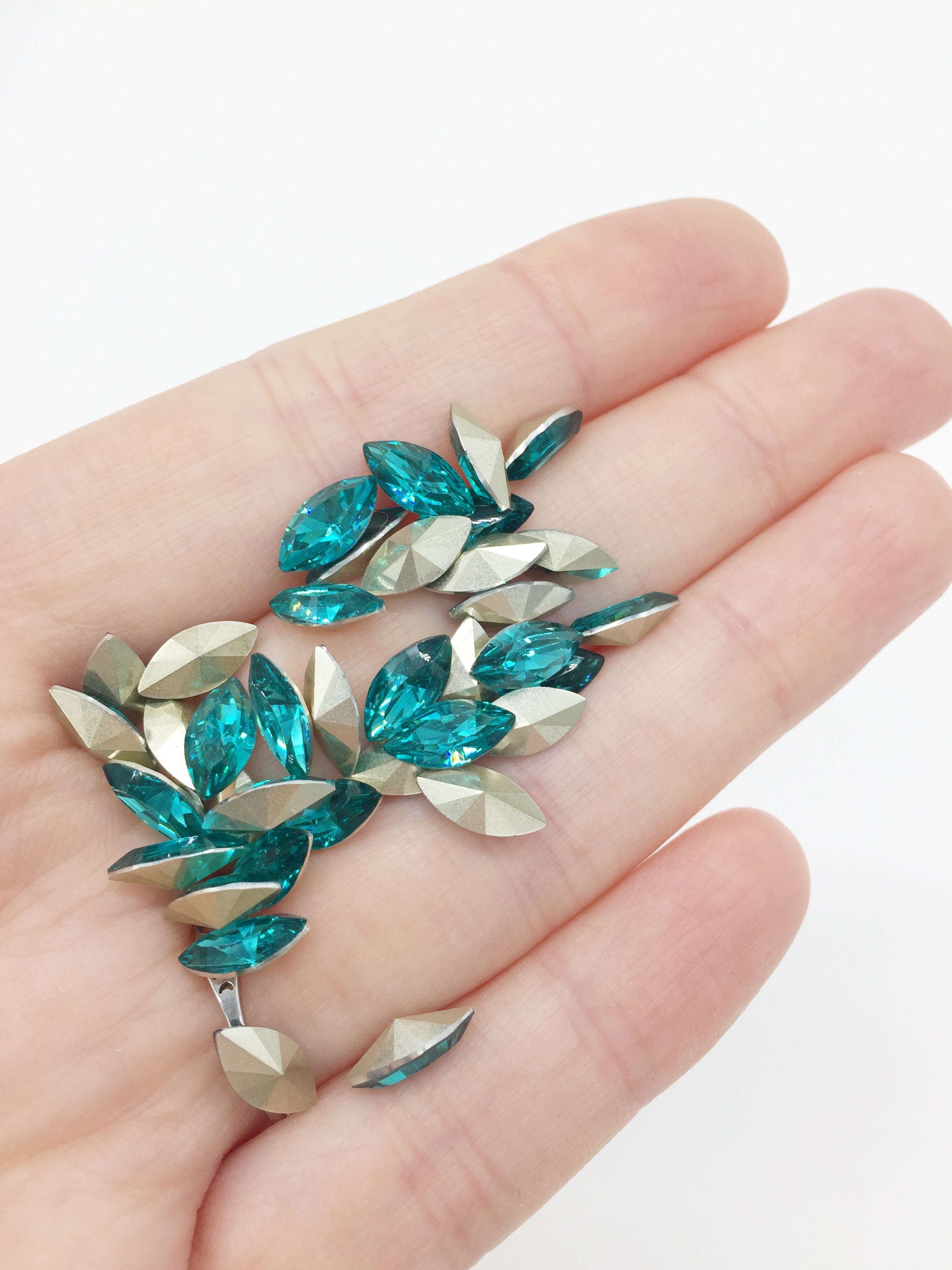 24 x 5x10mm Sea Blue Crystal Navette Rhinestones, Foiled Back (4085)