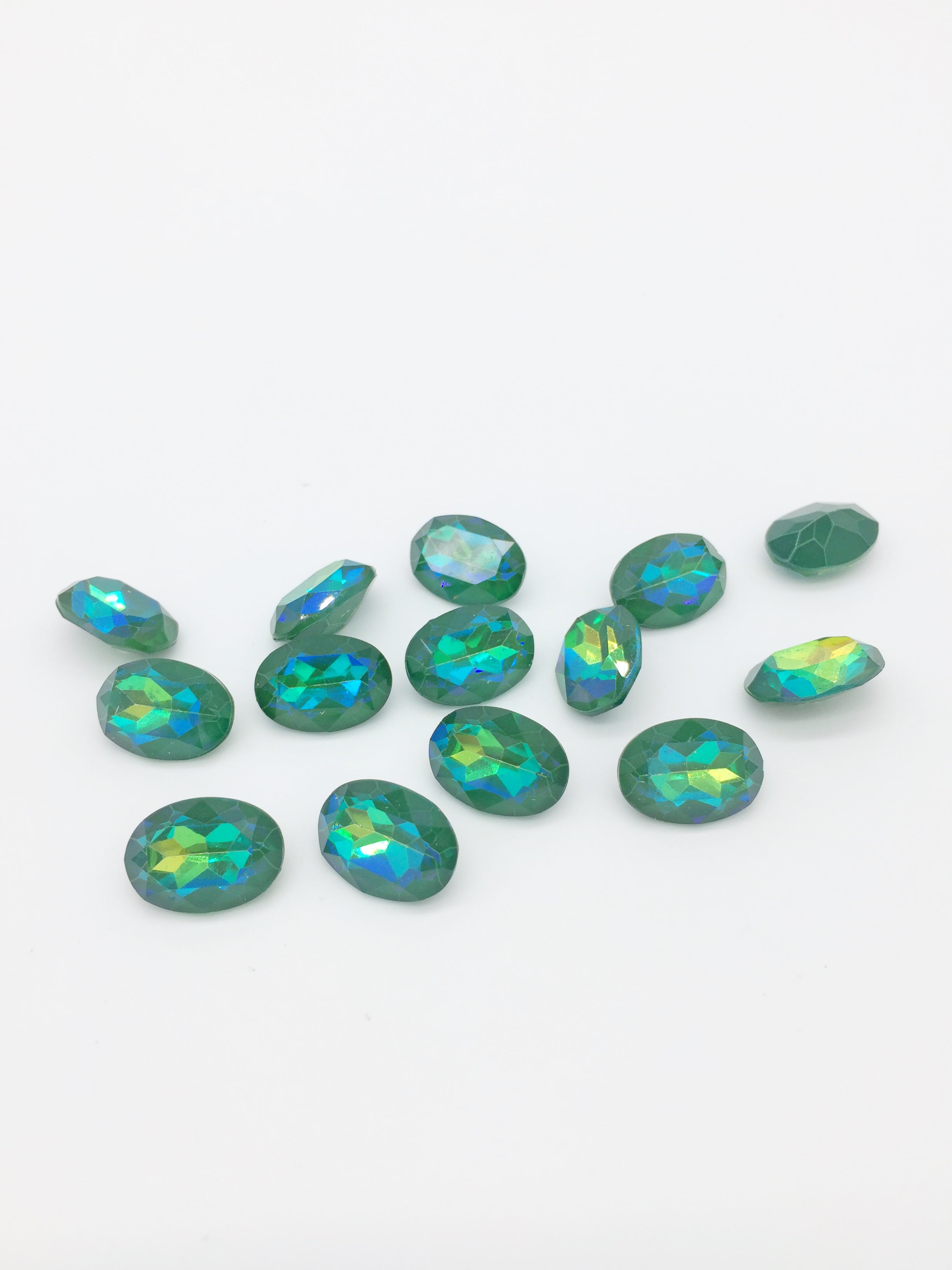 12 x 10x14mm Iridescent Emerald Green Oval Cut Rhinestones, Foiled Back (4089)