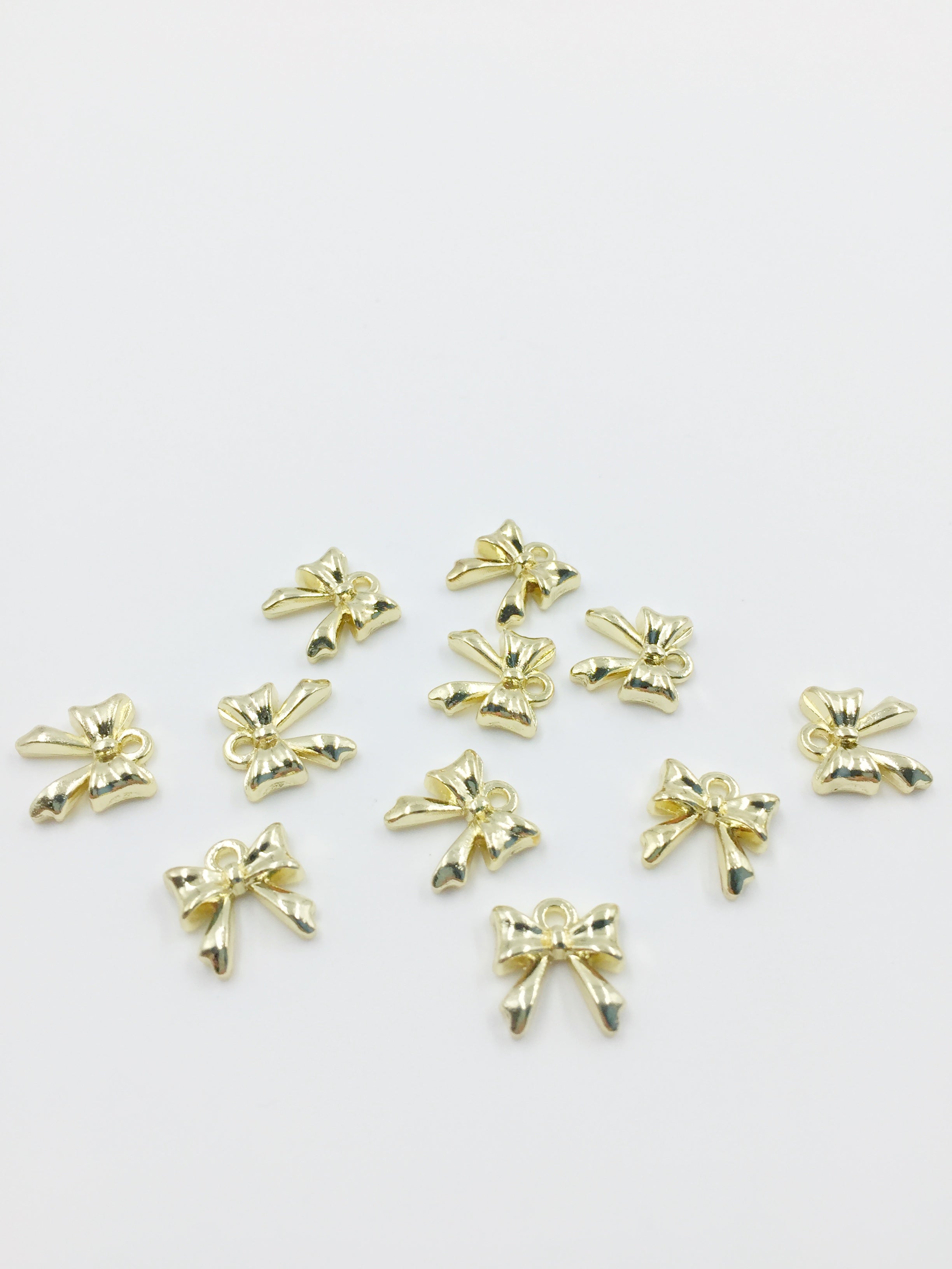 10 x Tiny Gold Plated Bowknot Charms, 11mm (3448)