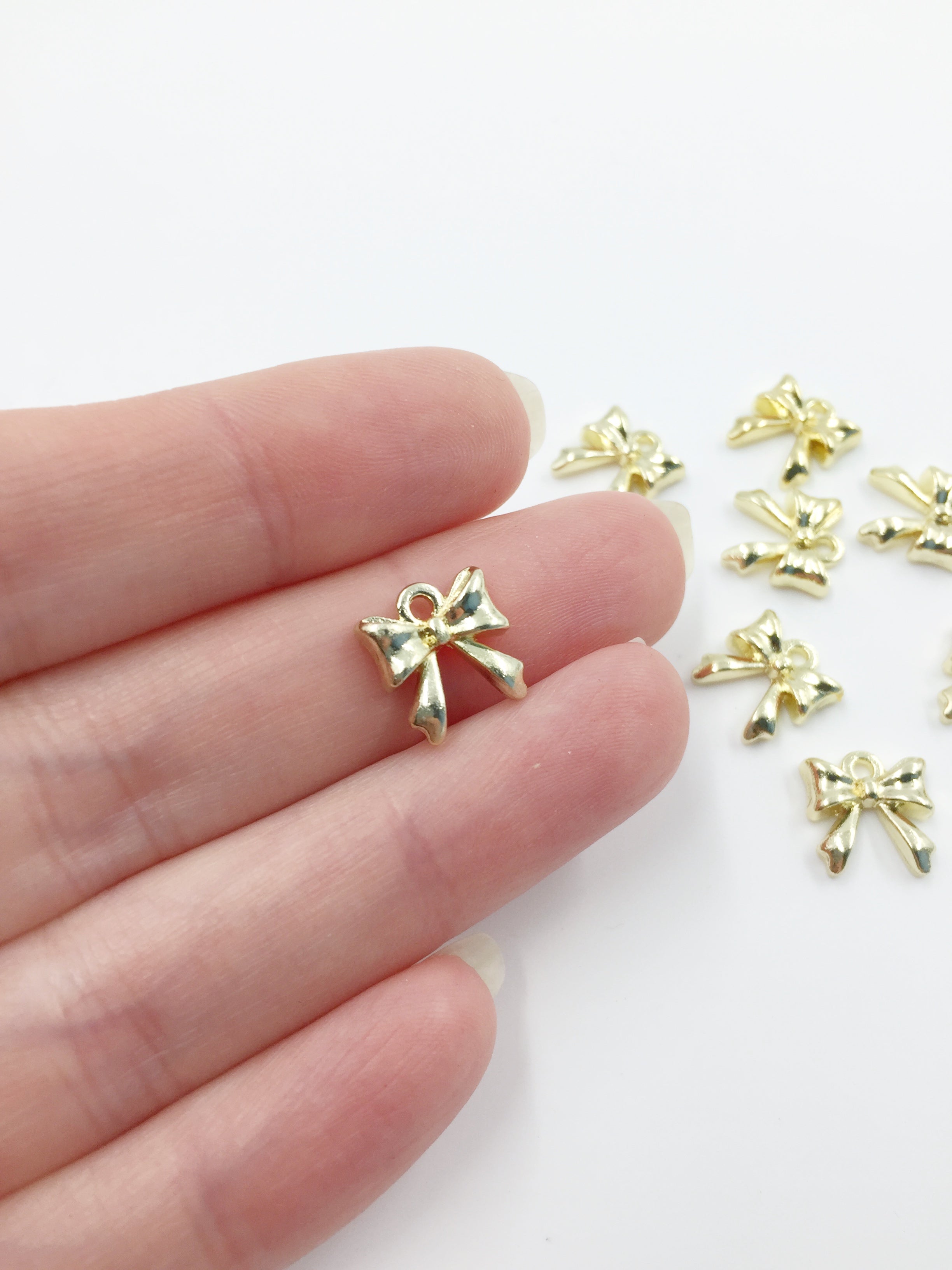 10 x Tiny Gold Plated Bowknot Charms, 11mm (3448)