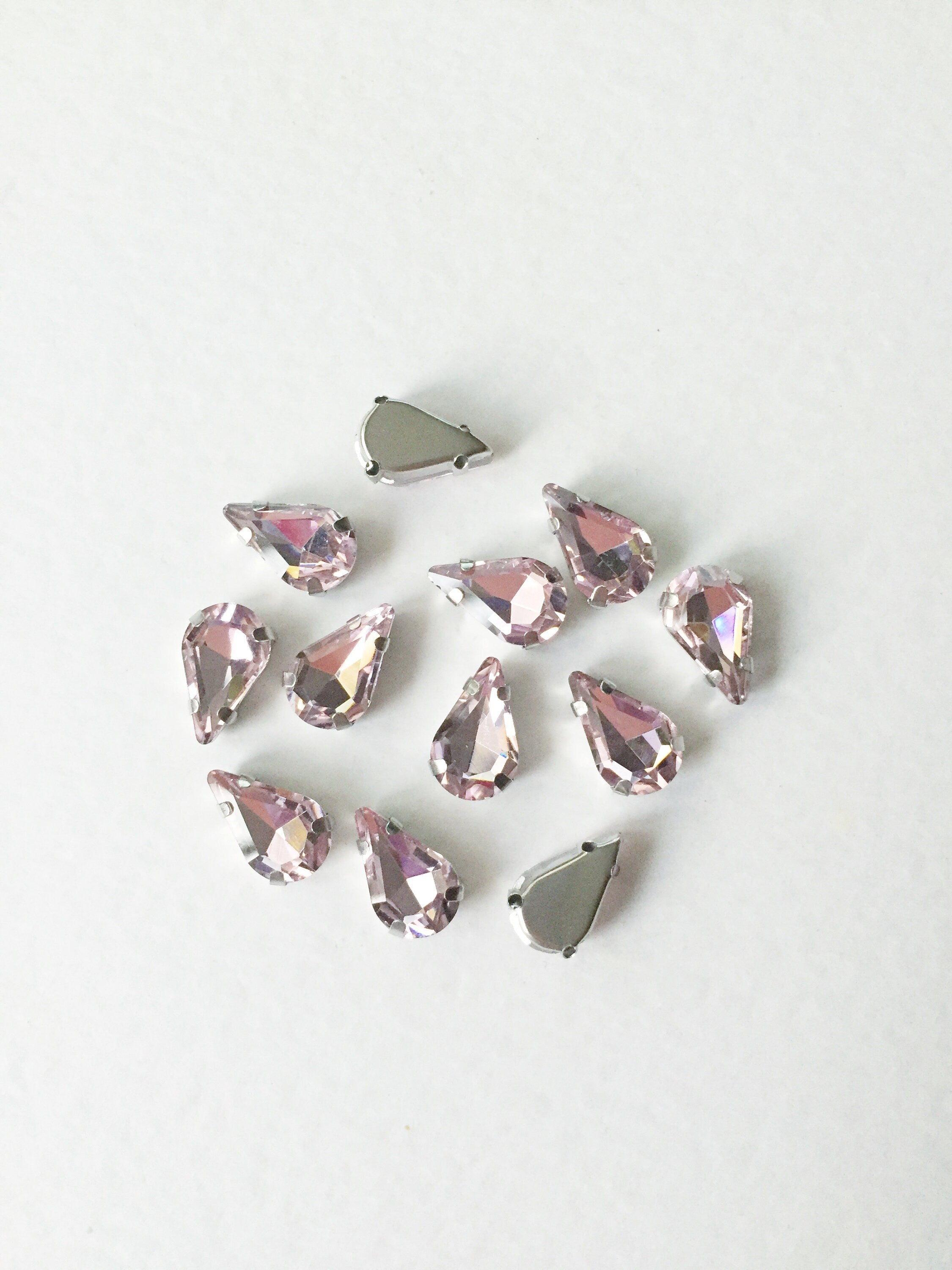 12 x 8x13mm Pink Glass Teardrop Rhinestone in Sew-on Rhodium Tone Setting