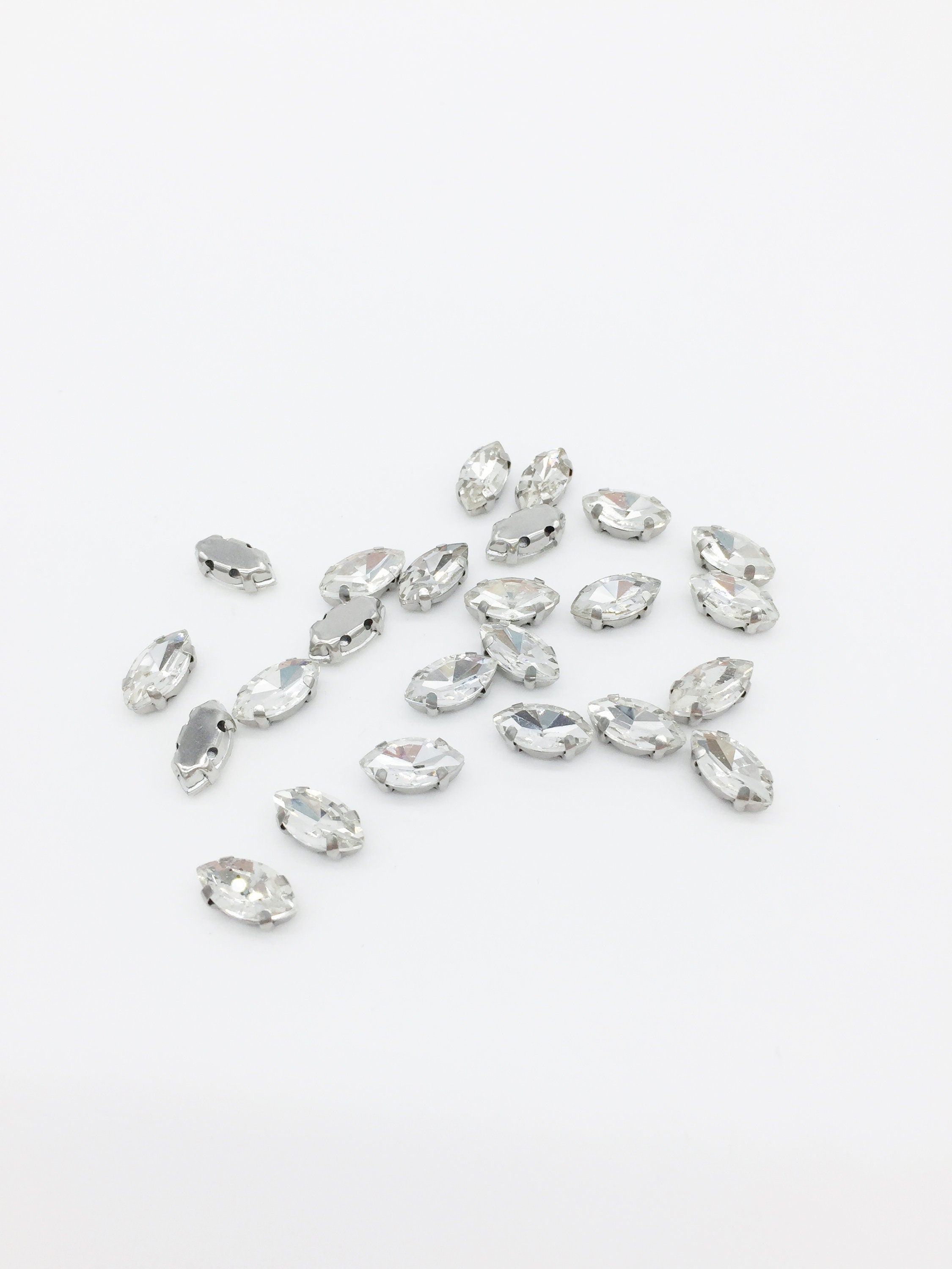 24 x 5x10mm Rhodium Clear Glass Navette Rhinestones, Sew-on Crystals (2795)