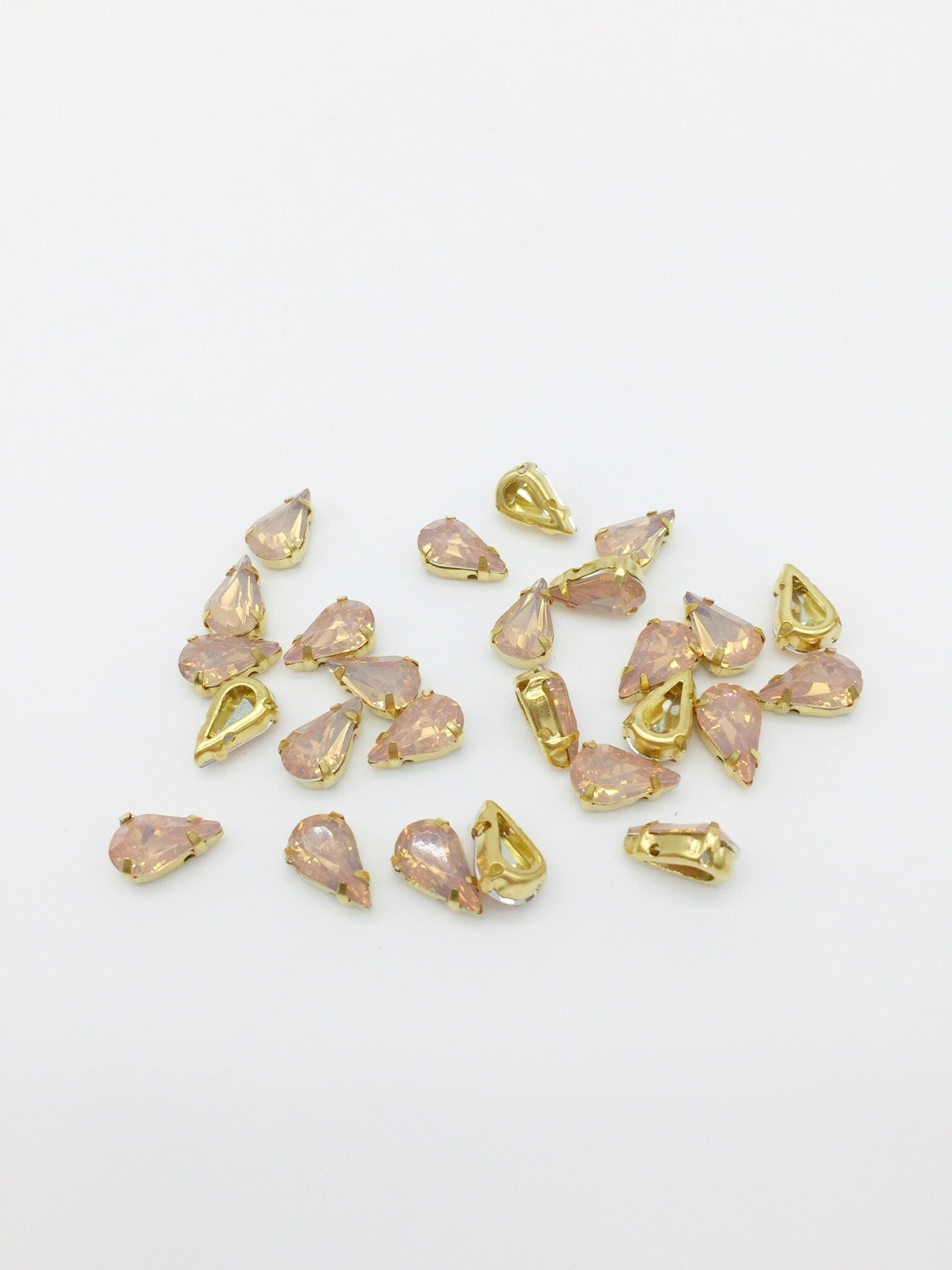 24 x 6x10mm Teardrop Peach Opal Rhinestones in Gold Tone Sew-on Setting (3642)