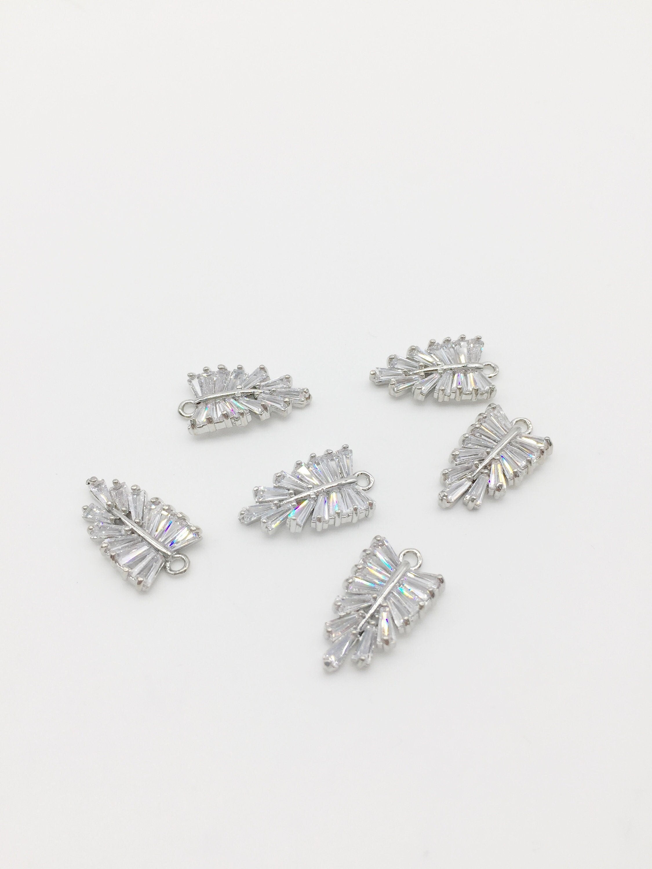 1 x Rhodium Plated Cubic Zirconia Palm Leaf Shaped Pendant, 18x10mm (0307S)