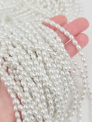 1 strand x White or Ivory Rice Pearl Beads, 6x4mm, 31 inch