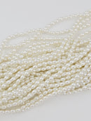 1 strand x White or Ivory Rice Pearl Beads, 6x4mm, 31 inch