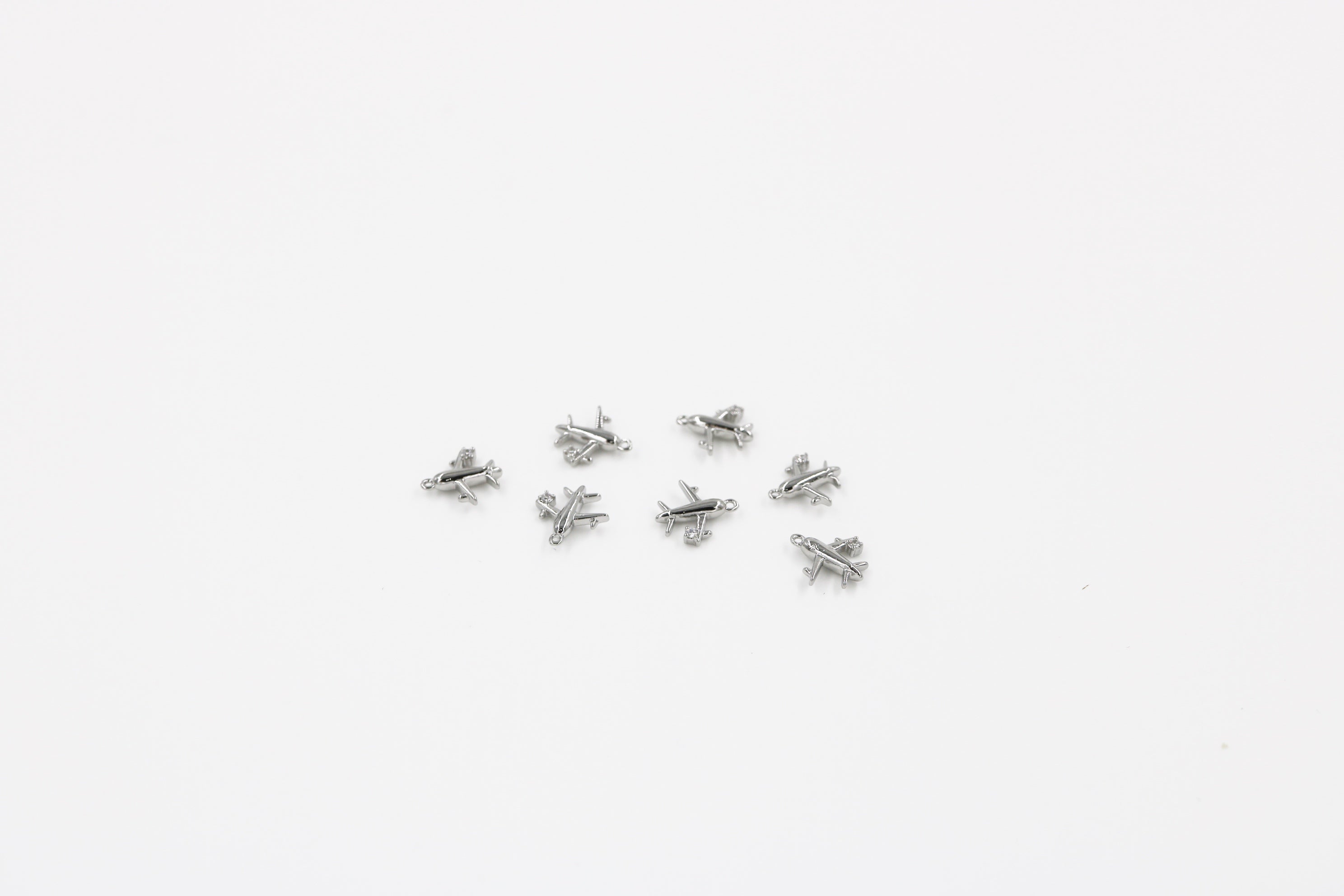 1 x Tiny Platinum Plated 3D Airplane Pendant, 11x10mm (1427S)