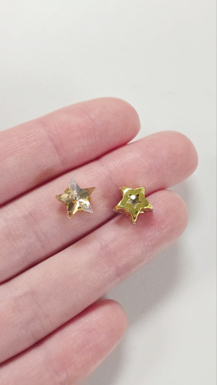 12 x 10mm Golden Shadow Crystal Star Rhinestones, Sew-on Gold Base (0308)