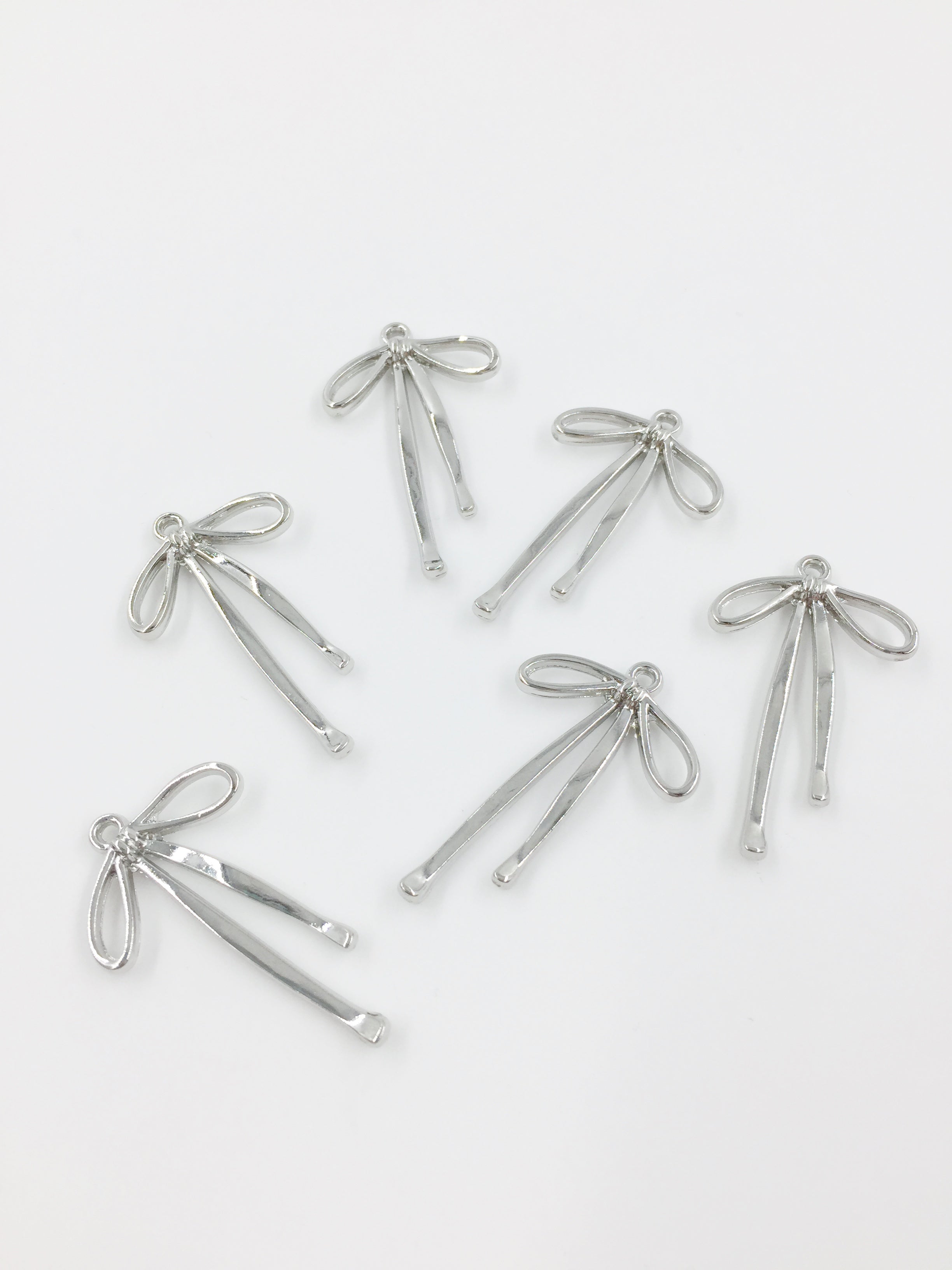 4 x Silver Bowknot Pendants, 33x20mm
