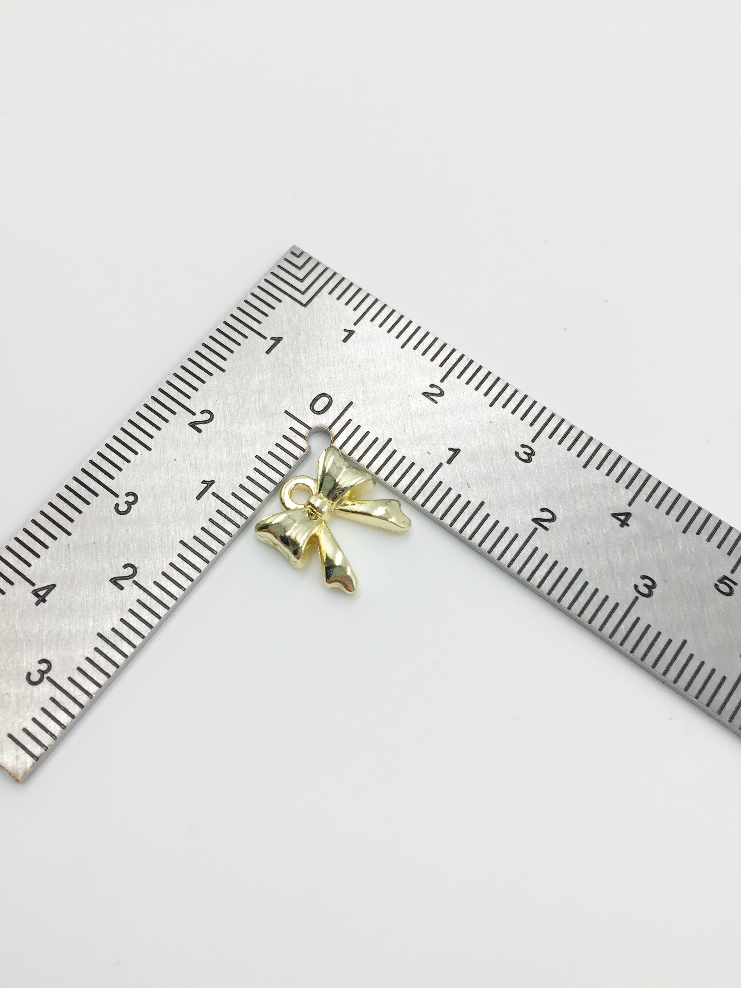 10 x Tiny Gold Plated Bowknot Charms, 11mm (3448)