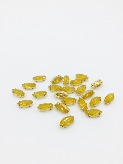 12 x 6x12mm Navette Yellow Opal Rhinestones in Gold Tone Sew-on Setting (3833)