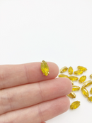 12 x 6x12mm Navette Yellow Opal Rhinestones in Gold Tone Sew-on Setting (3833)