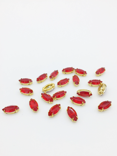 12 x 6x12mm Marquise Cut Red Opal Rhinestones in Gold Tone Sew-on Setting (3841)