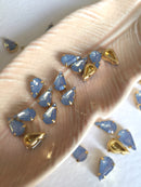 24 x 6x10mm Teardrop Blue Opal Rhinestones in Gold Tone Sew-on Setting (3634)