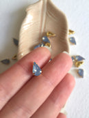 24 x 6x10mm Teardrop Blue Opal Rhinestones in Gold Tone Sew-on Setting (3634)