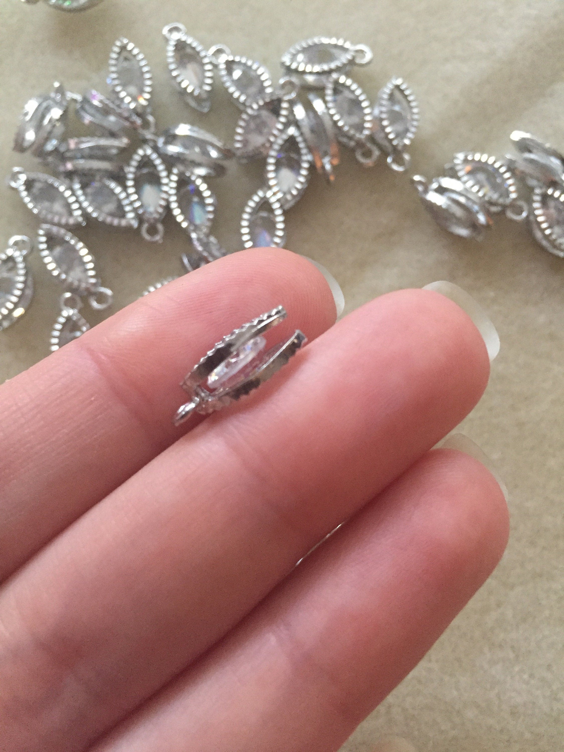 2 x Platinum Plated Floating Cubic Zirconia Leaf Charms