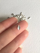 50 x Tiny Bright Silver Metal Leaf Charms, 4x7mm (0092)