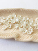 40 x Tiny Ivory Pearlised Flower Beads, 6.5mm (0653)