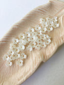 40 x Tiny Ivory Pearlised Flower Beads, 6.5mm (0653)
