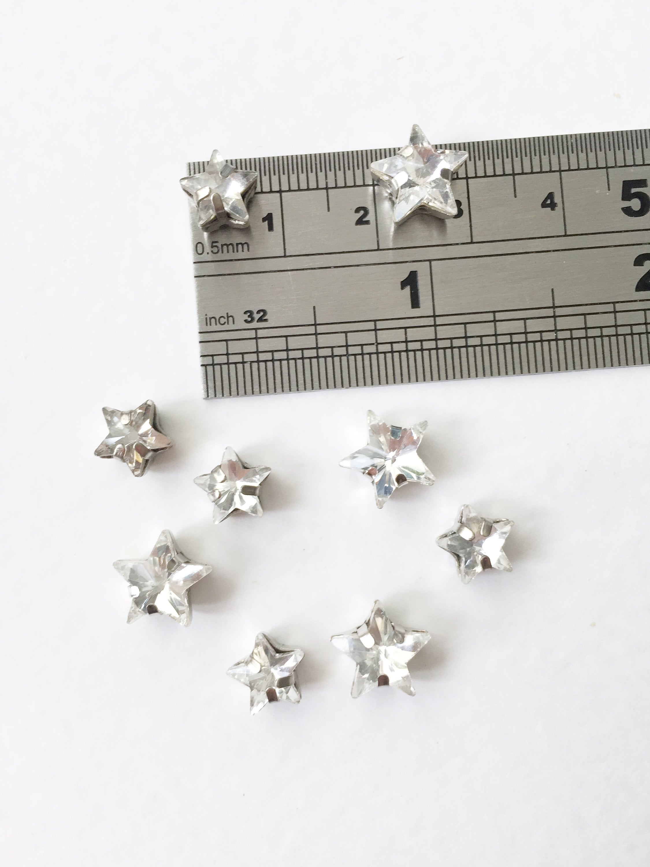 12 x 10mm Clear Crystal Star Rhinestones, Sew-on with Rhodium Base (3640)