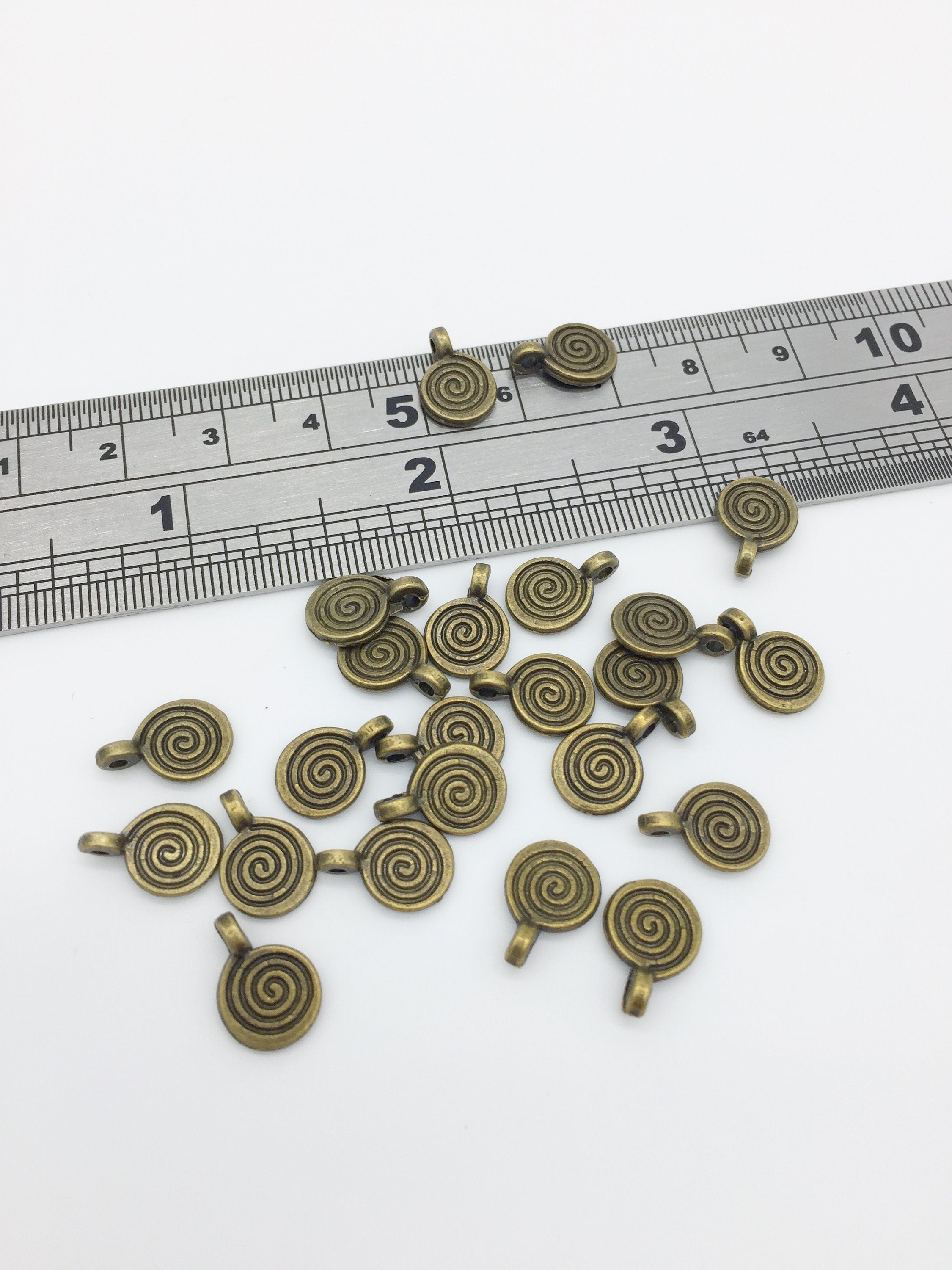 50 x Antique Bronze Plated Small Swirl Charms, 11.5x8mm (3054)