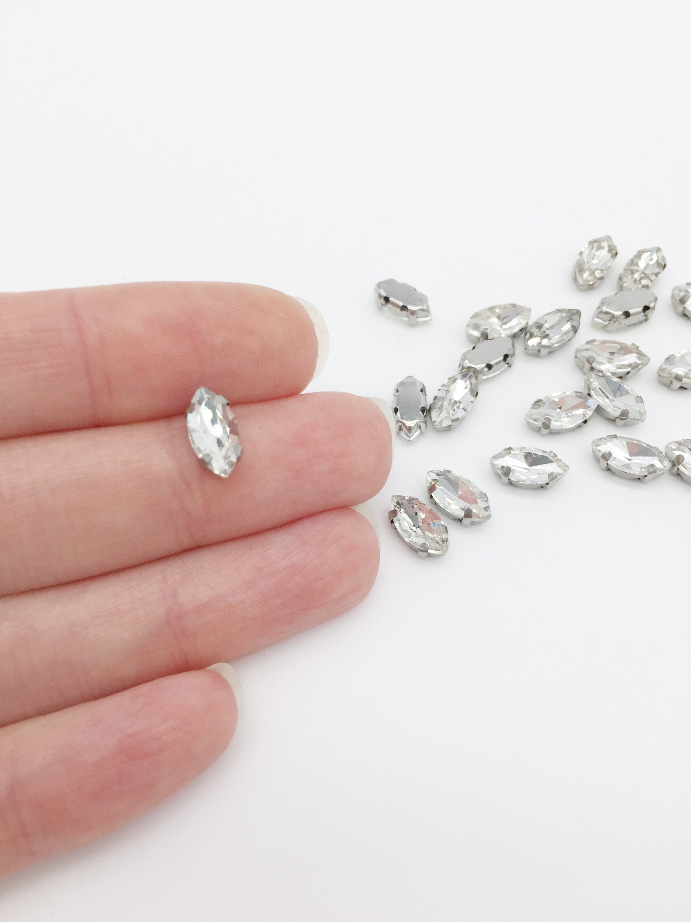 24 x 5x10mm Rhodium Clear Glass Navette Rhinestones, Sew-on Crystals (2795)