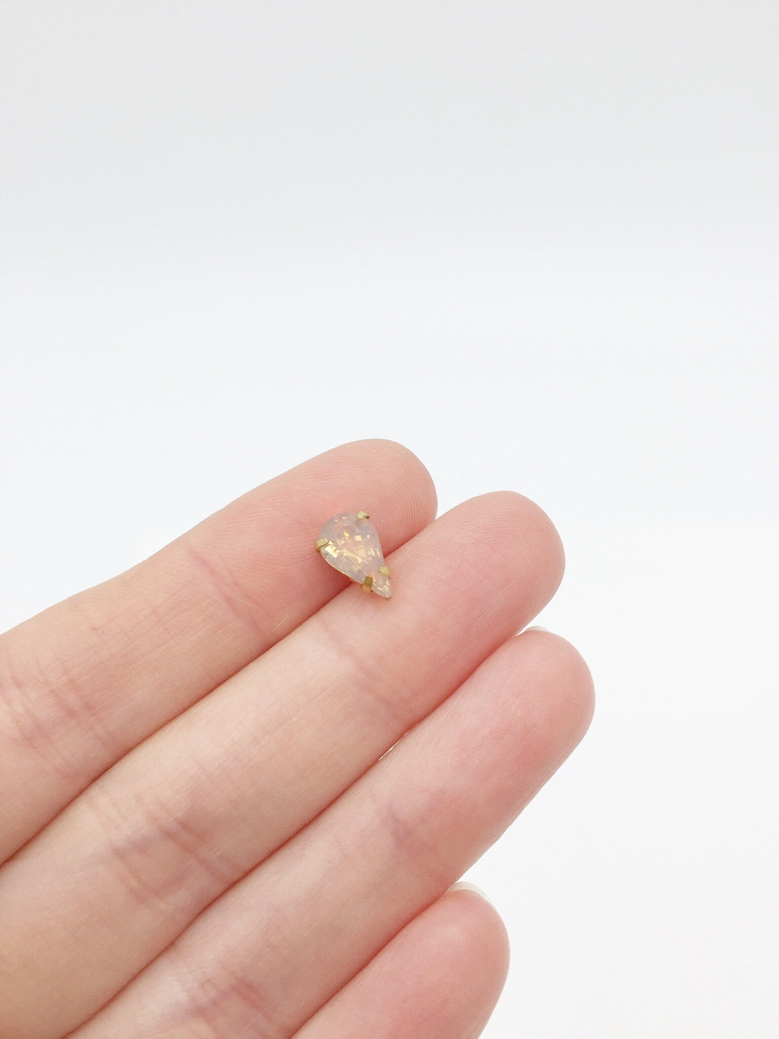 24 x 6x10mm Teardrop Peach Opal Rhinestones in Gold Tone Sew-on Setting (3642)